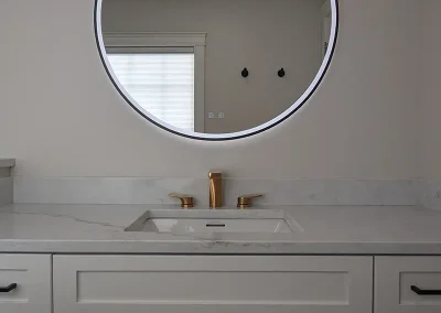 Completed bathroom renovation by My Home Handyman in Calgary, Alberta. Featuring modern fixtures, updated vanities